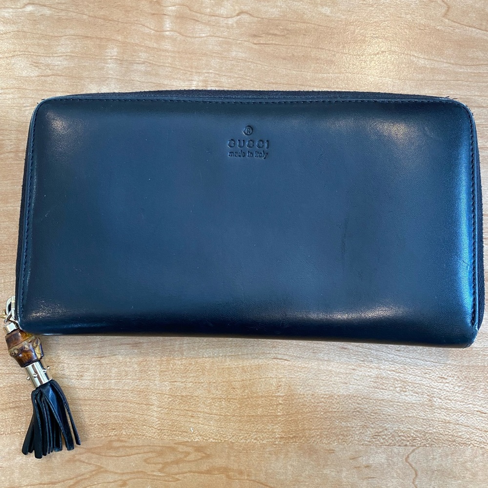 Black Gucci zip around wallet